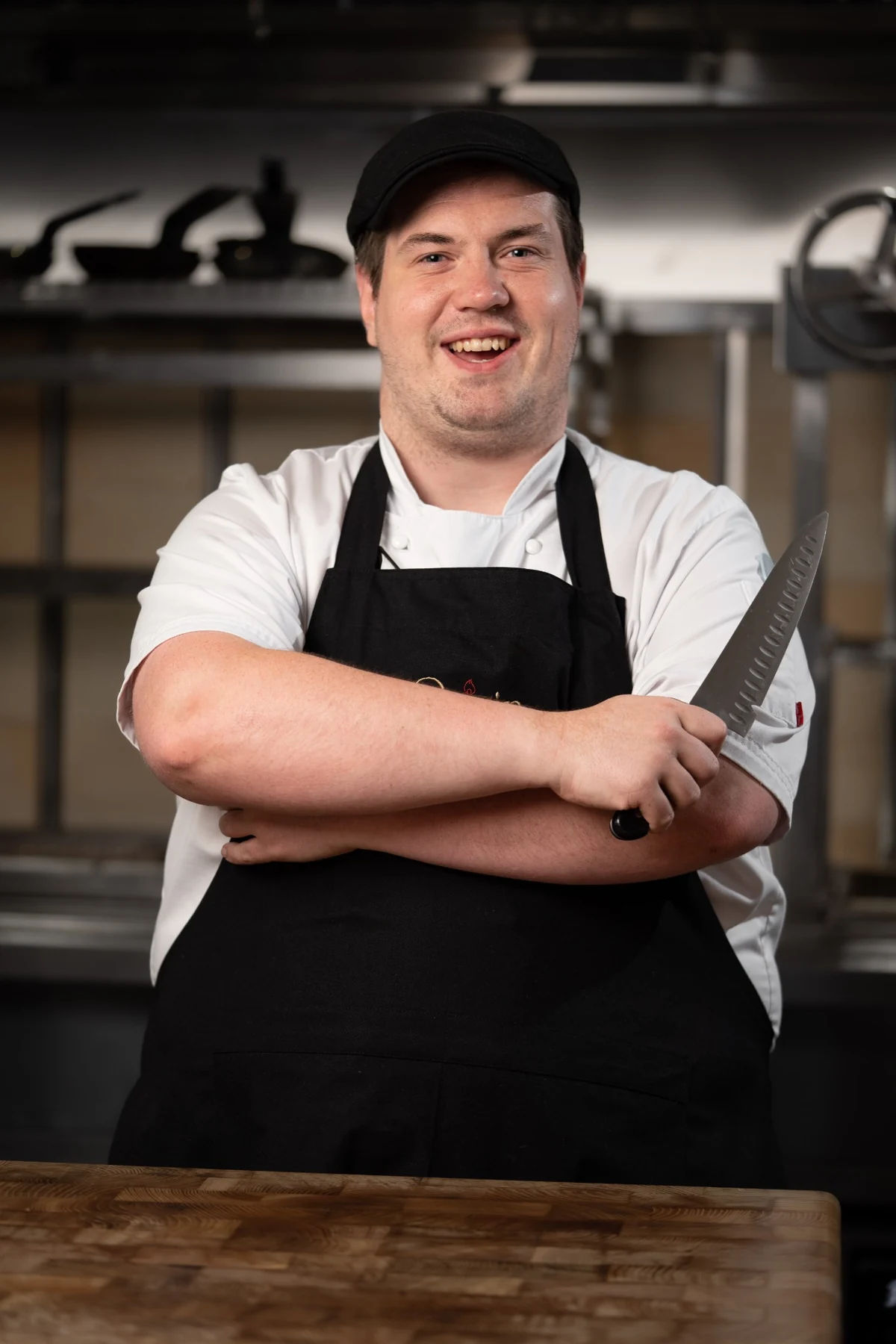 Same chef smiling warmly to the camera