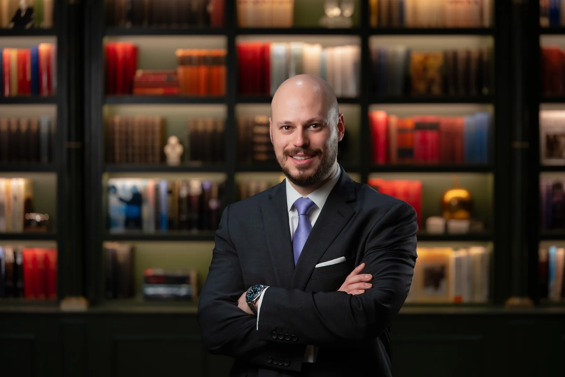 Smiling male member of the same corporate team